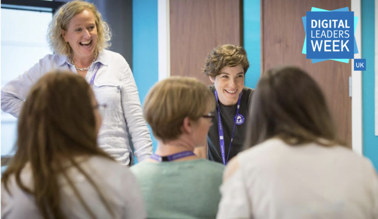 women discussing and networking in a room