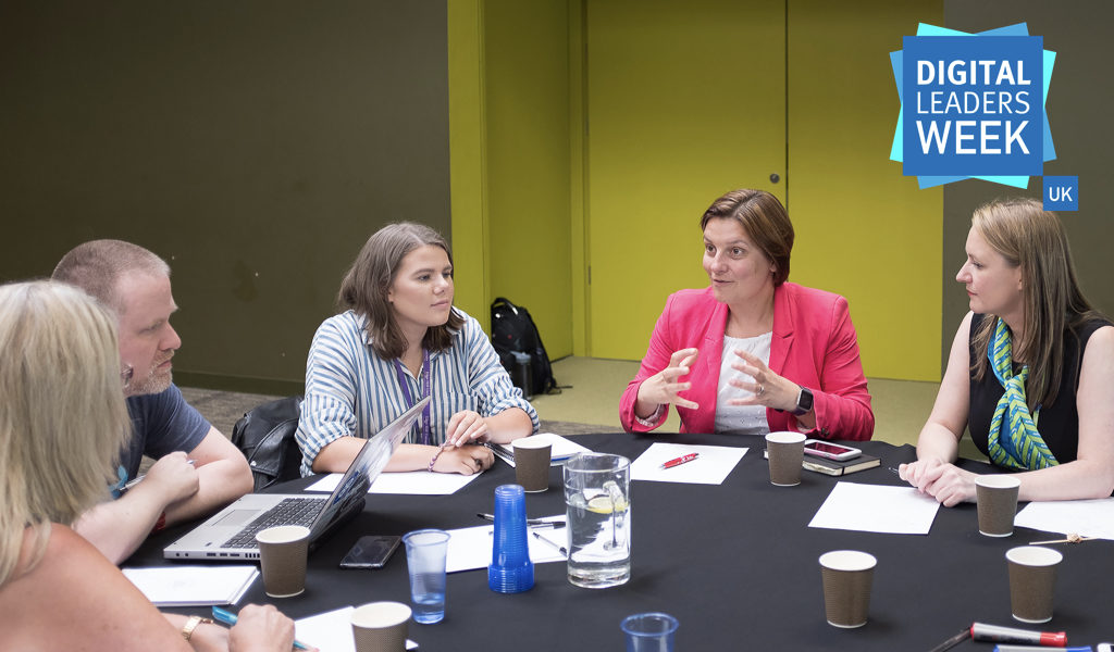 Attendees discuss course topics