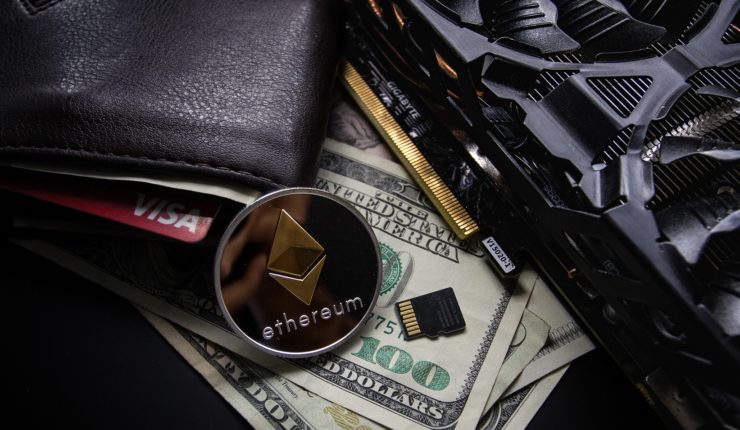 Cryptocurrencies by a leather wallet