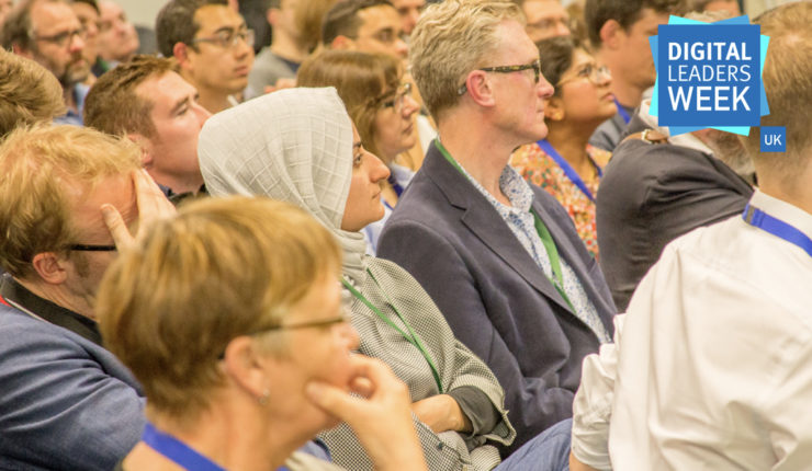 attendees listening to the speakers