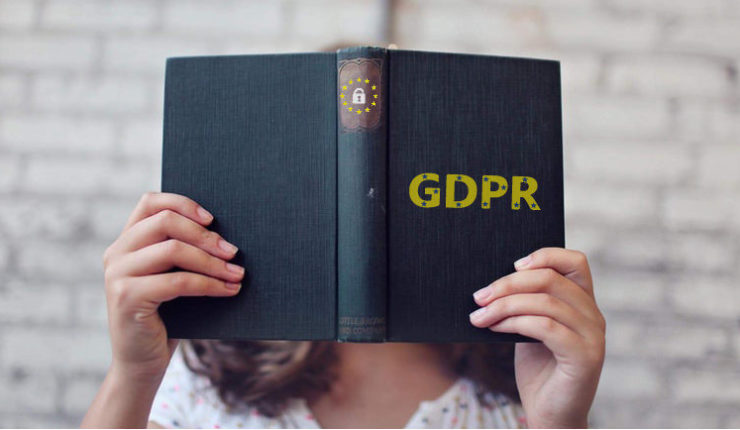 Man on laptop with GDPR and EU symbol on the screen