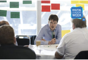 man with microphone facilitating masterclass