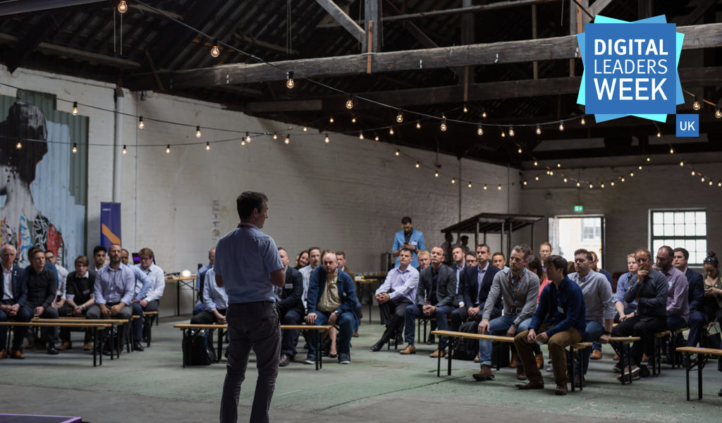 Attendees listening to a talk