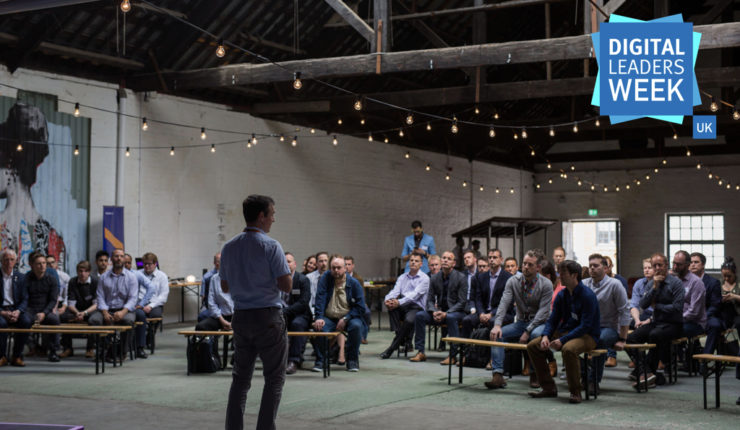 Attendees listening to a talk