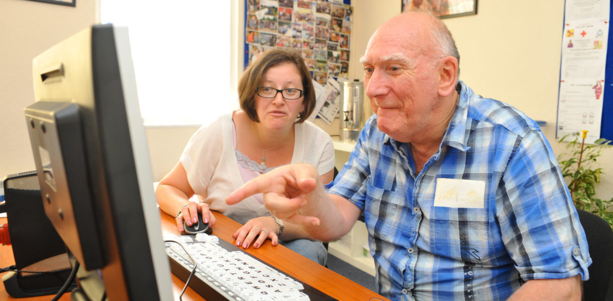 Older man using a computer