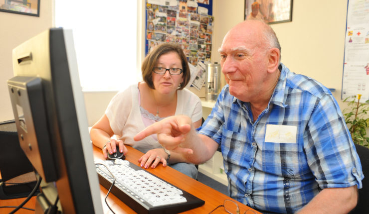 Older man using a computer