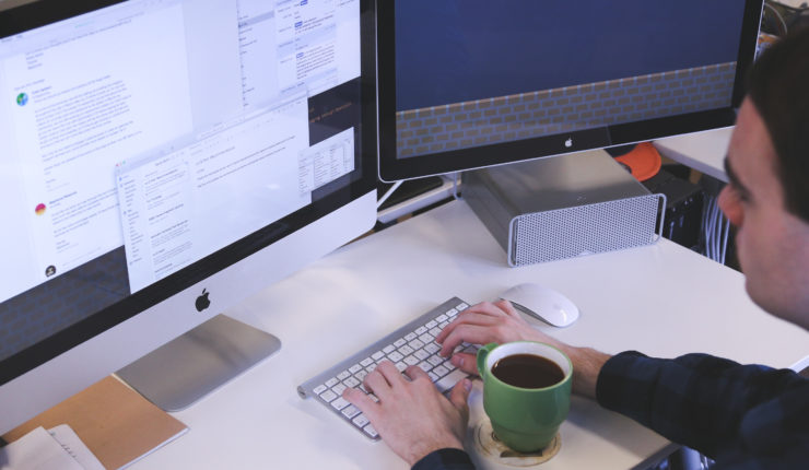 Man at a desk completing a digital maturity assessment