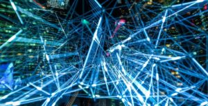 Big Data visualisation through neon tubes by a night cityscape