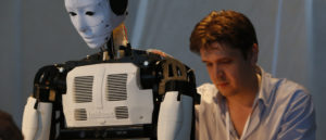 Man working on a robot machine