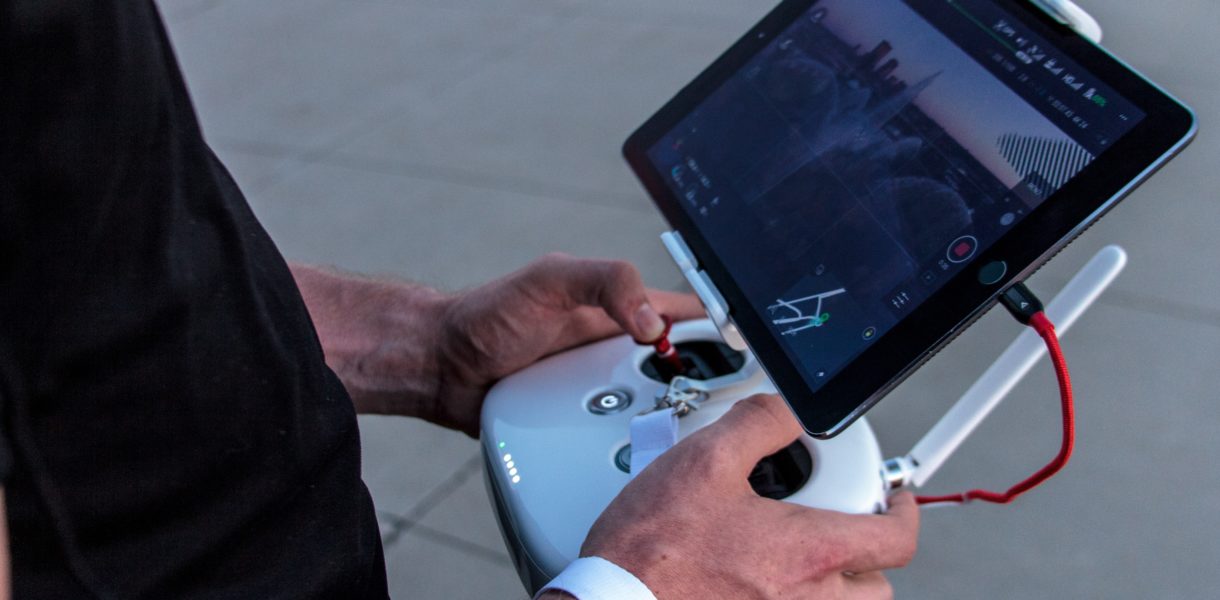 Man operating drone following regulation