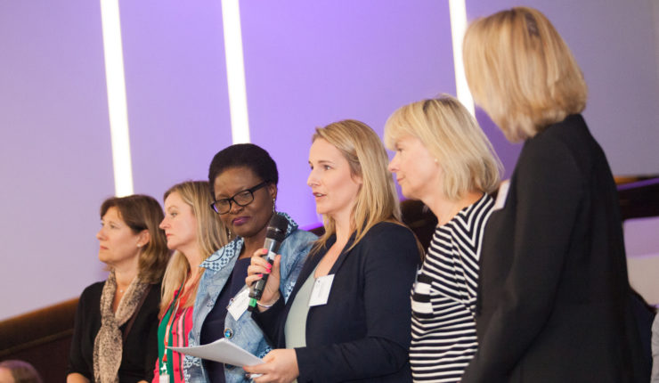 diverse women at a conference
