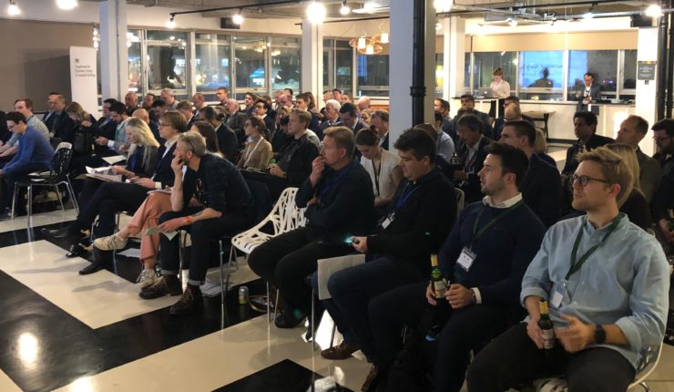 large crowd sitting at event