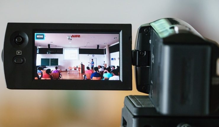 Video camera recording lecture for an accessible university experience
