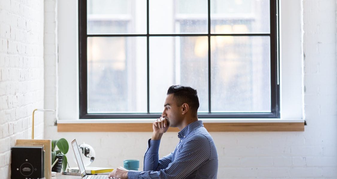 man working on computer