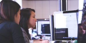 women working on computer