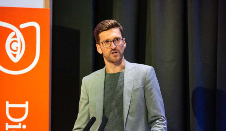 Mark McGinn speaking at event