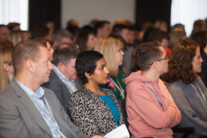 people sitting at conference