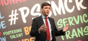 Man speaking at conference