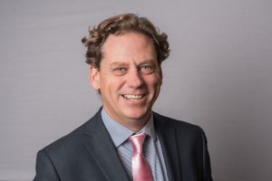 Photo of Seth Finegan, UK CEO of Informed Solutions, one of the salon lead discussants