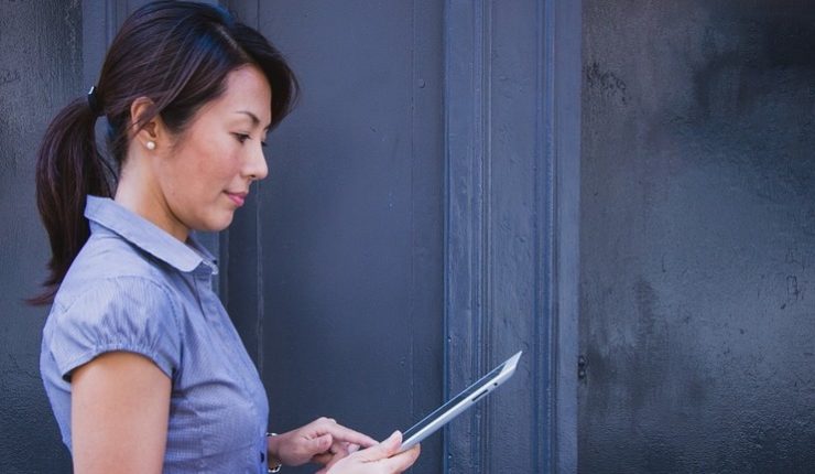 woman using ipad