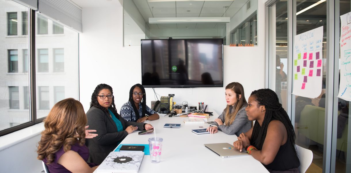 Women around a conference table