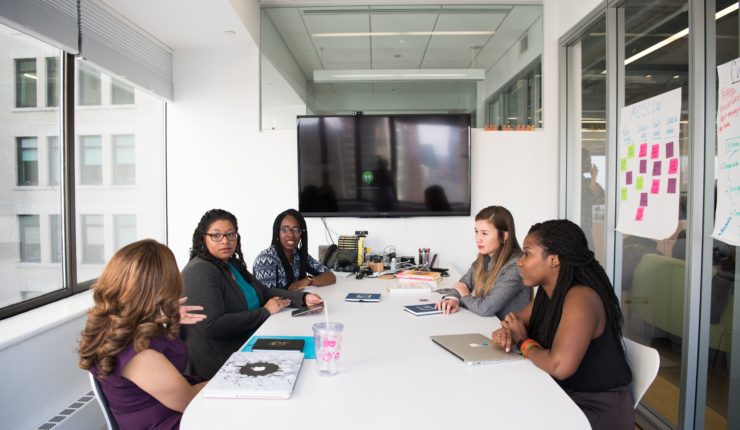 Women around a conference table
