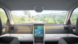 Interior of an autonomous self-driving car on the road.