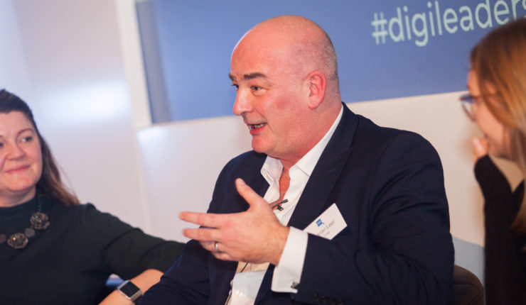 Adrian Leer speaking at conference
