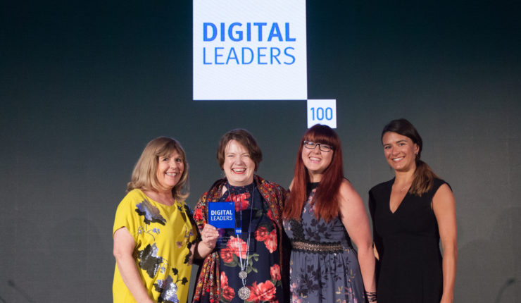 Awards host Maggie Philbin, Catherine Frather of Age UK receiving the award and Eve Joseph of Microsoft presenting