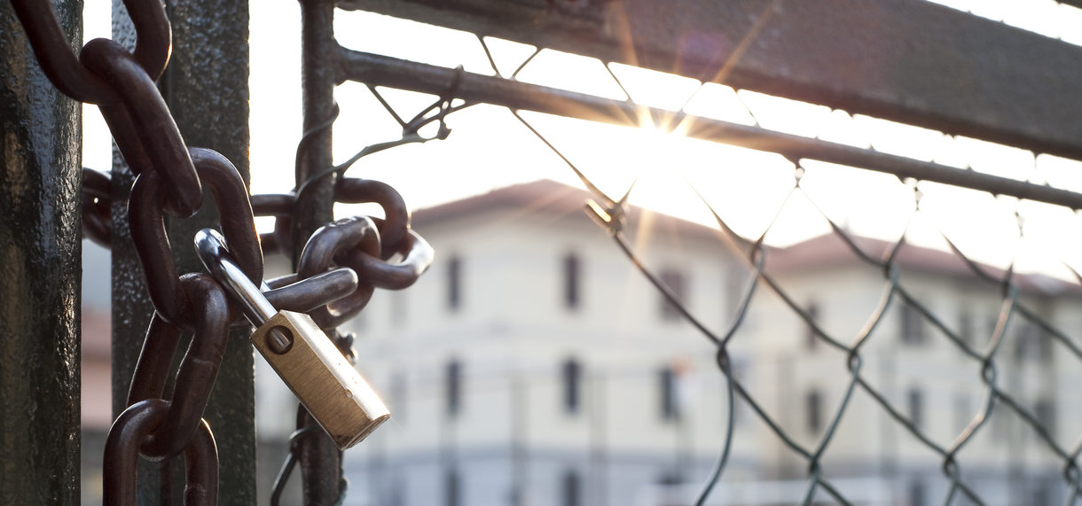Lock and hole in the net against the light
