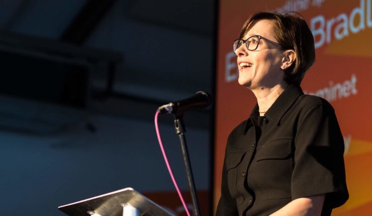 Eleanor Bradley speaking at stage