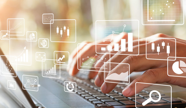 Business intelligence concept. Big data analytics, chart and graph icons and female hands typing on laptop.