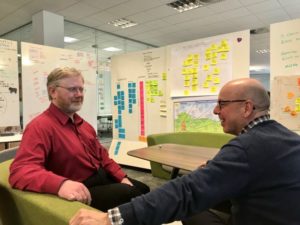 Sean (right) talking with colleague Barry