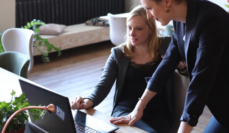 Two women on laptop