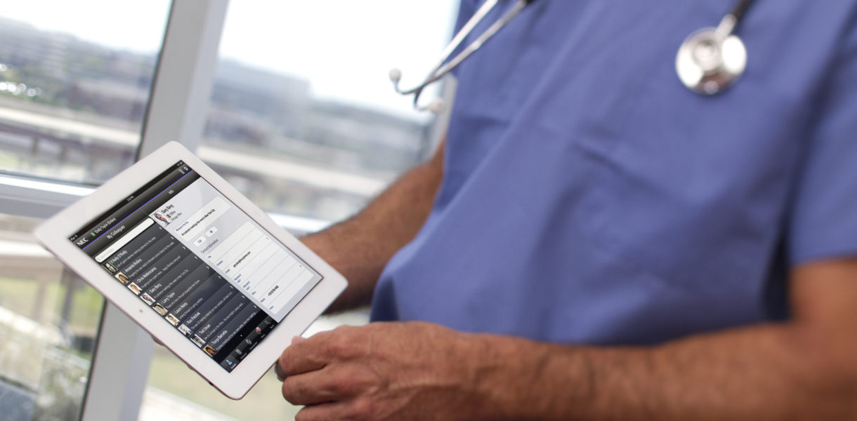 Doctor using ipad