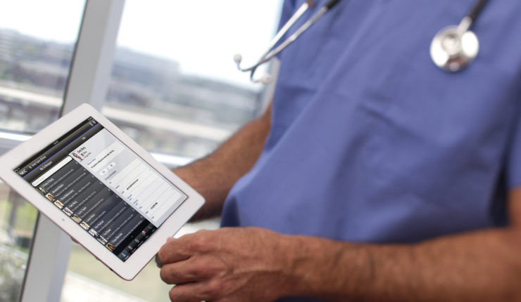 Doctor using ipad