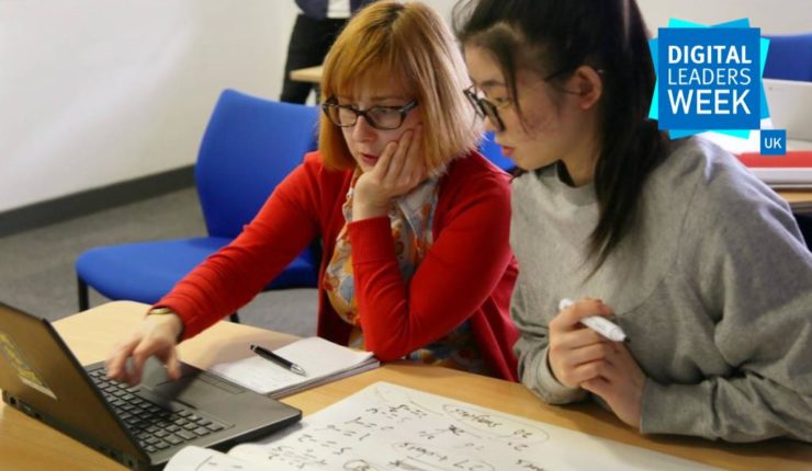 woman teaching girl