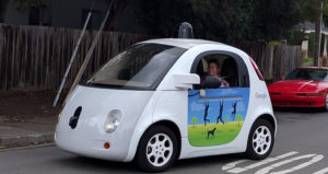 woman in driverless car