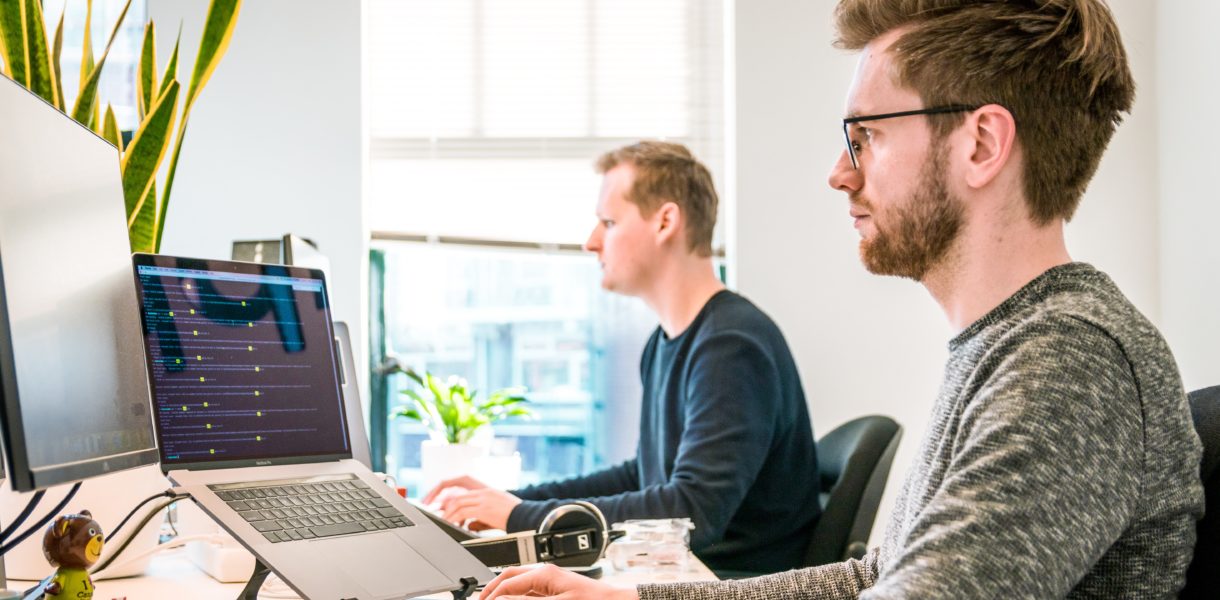 Man working on computer in office