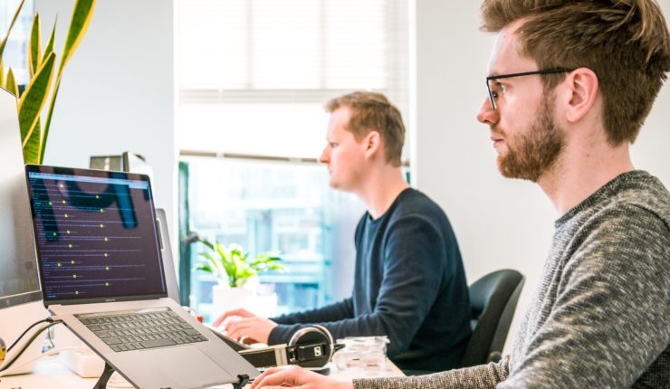 Man working on computer in office