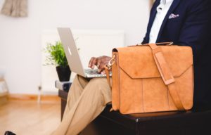man sitting with breifcase