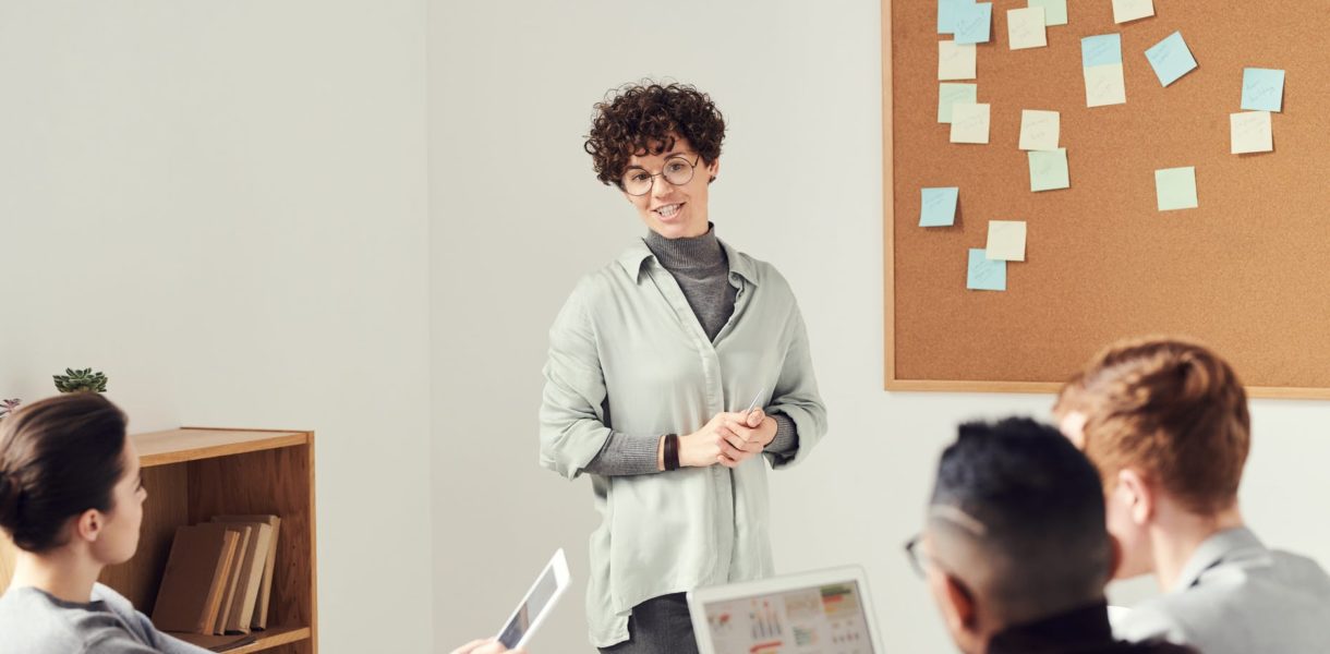 women presenting during meeting