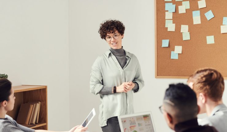 women presenting during meeting