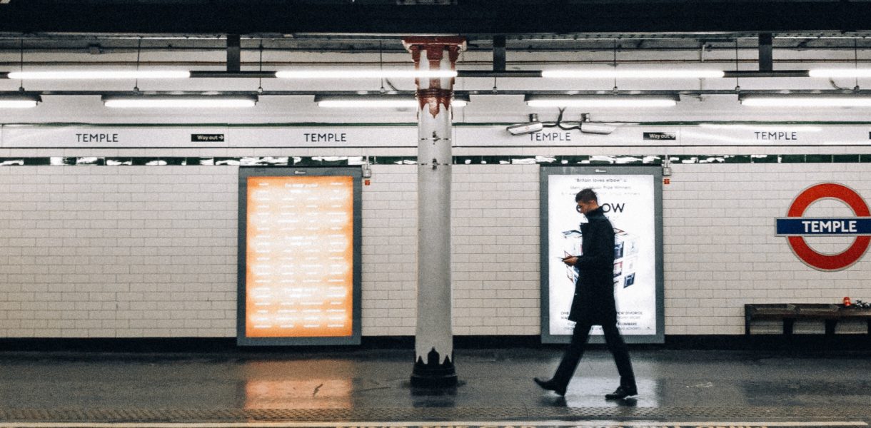 man walking in London underground