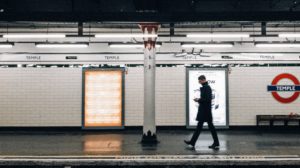 man walking in London underground