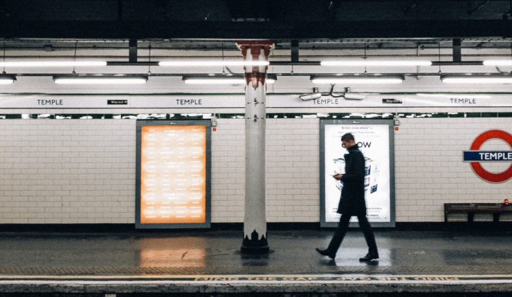 man walking in London underground