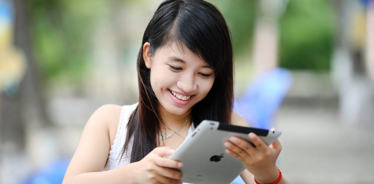 woman using Ipad