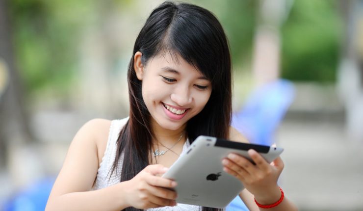 woman using Ipad