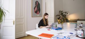 woman working from living room