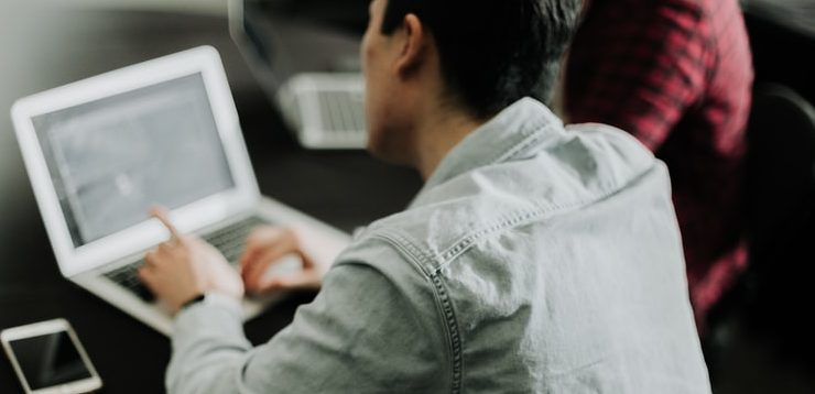 men working on computer